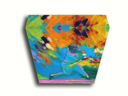 A colorful painting of a baseball player swinging a bat. The wide spectrum of vibrant colors are applies with thick brushstrokes, creating a sense of movement. Printed on canvas.