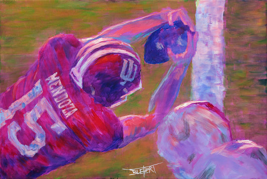 Painting of Indiana Hoosiers team quarterback Fernando Mendoza catching a football.