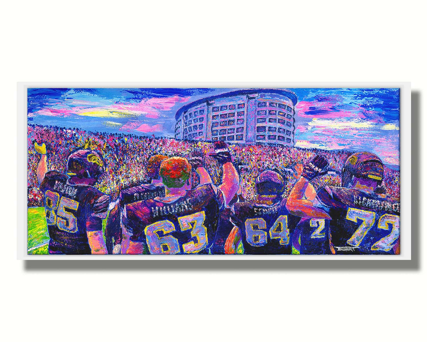 A painting of the Iowa Hawkeyes football team from behind, waving at the massive crowd of fans in front of them. Printed on canvas in a float frame.