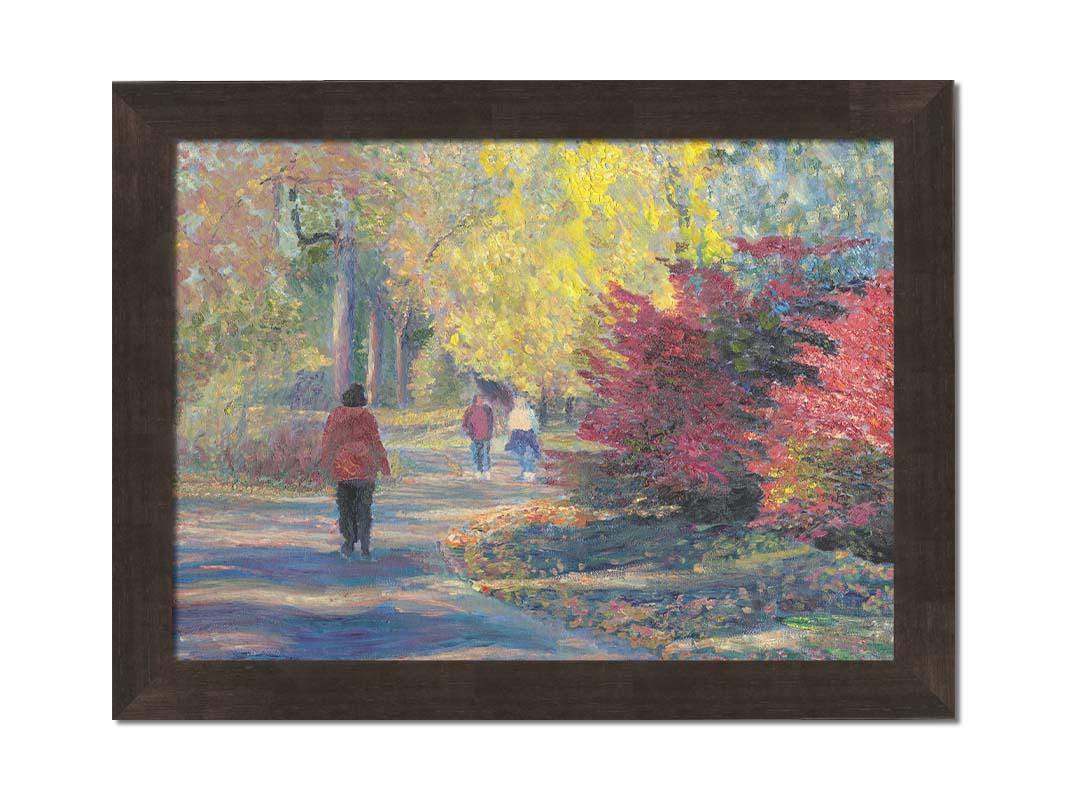 A painting of people walking in a park, the leaves changing to yellows and reds for autumn. Printed on canvas and framed.