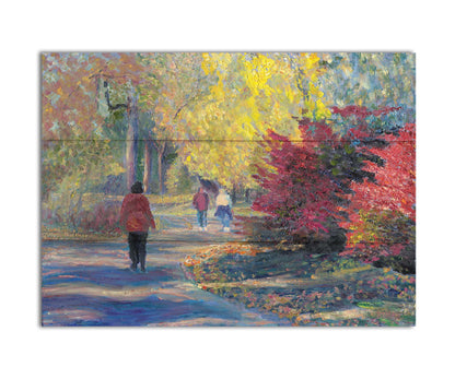 A painting of people walking in a park, the leaves changing to yellows and reds for autumn. Printed on a box board.