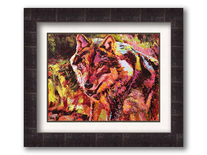 A painting of a wolf rendered in reds and yellows. Printed on paper, matted, and framed.