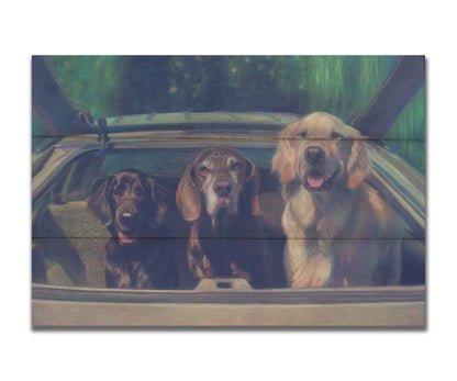 A painting of three dogs in the back of a hatchback, ready to go for a car ride. Printed on a box board.