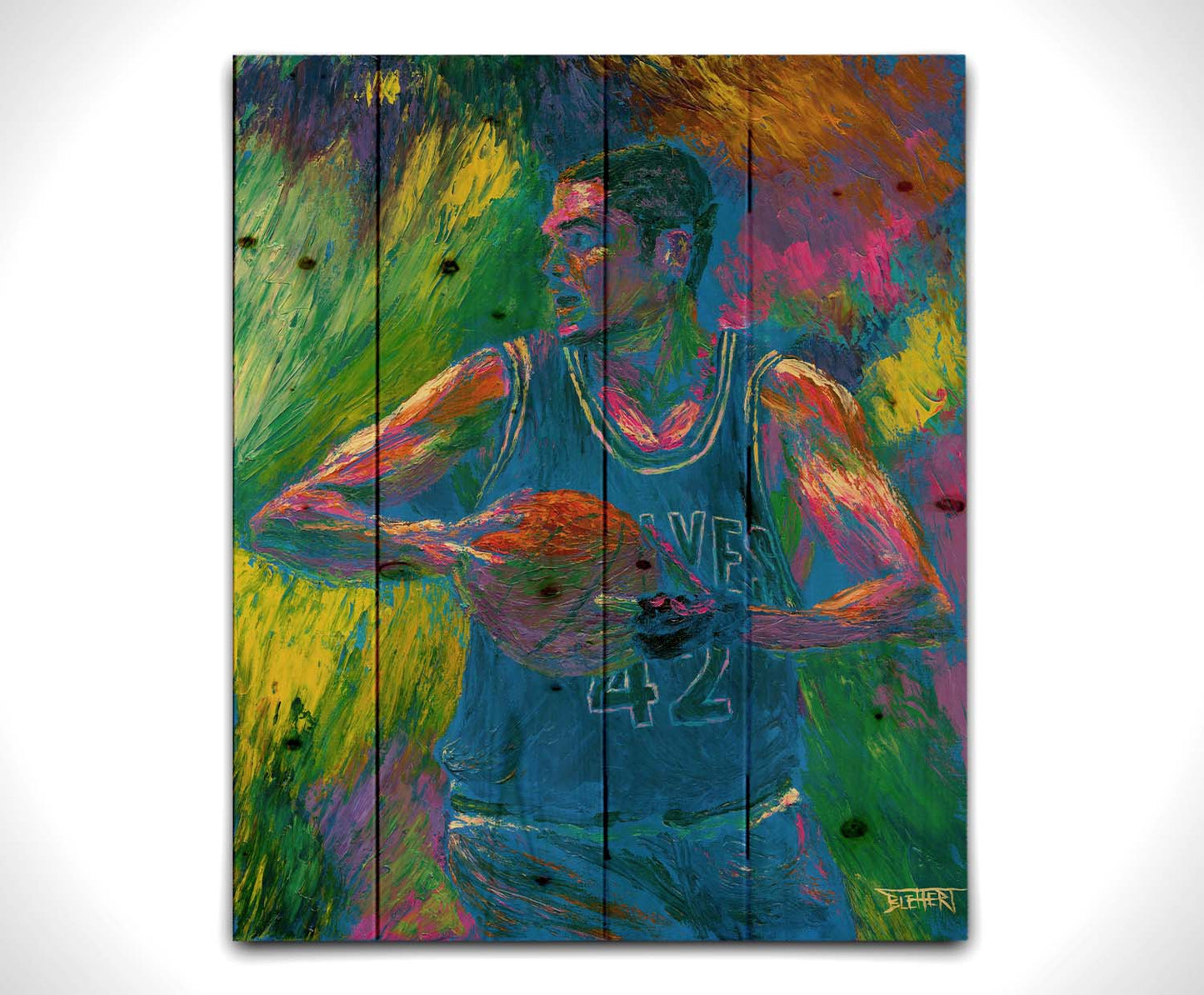 A painting of Minnesota TImberwolves basketball player Kevin Love holding a basketball. Printed on a wood pallet.