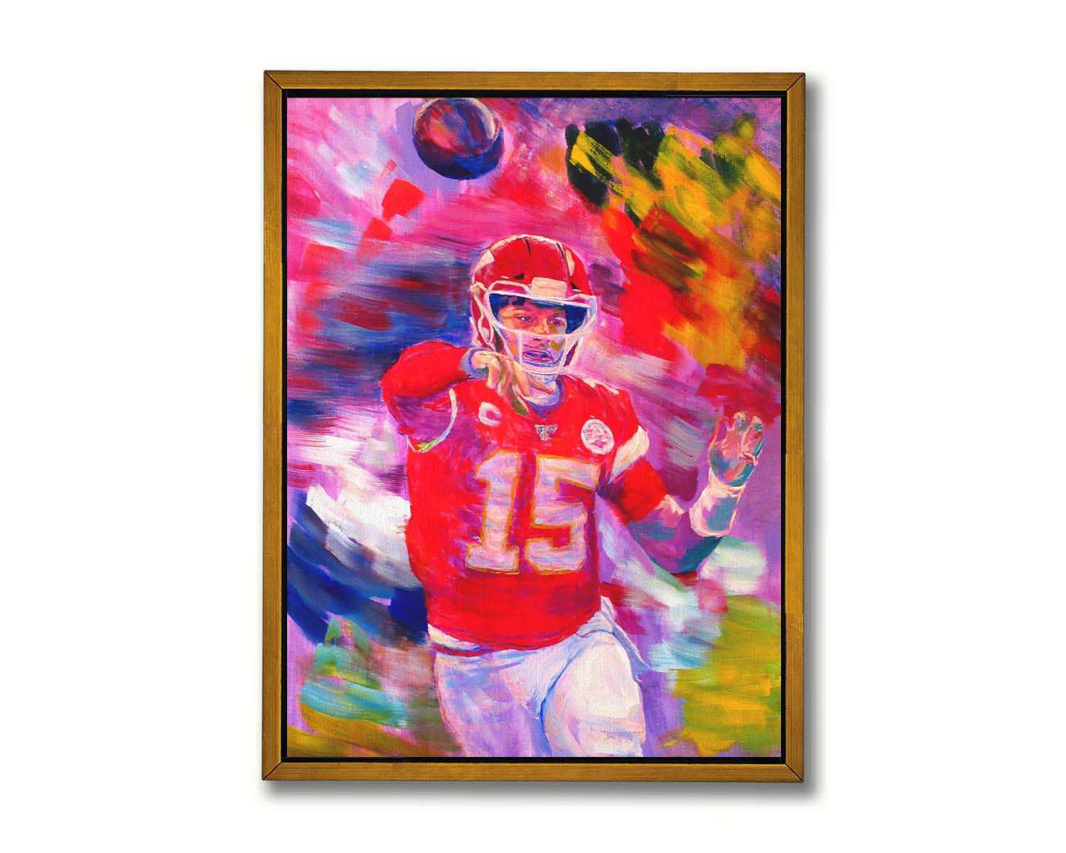 A painting of Kansas City Chiefs football team quarterback Patrick Mahomes throwing a football. Printed on canvas in a float frame.