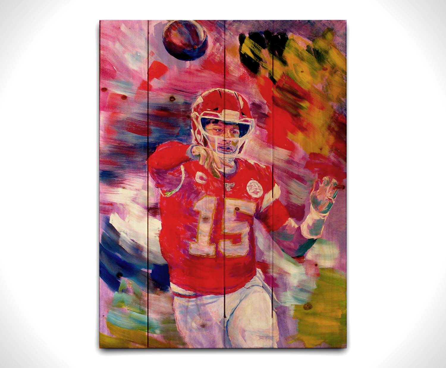 A painting of Kansas City Chiefs football team quarterback Patrick Mahomes throwing a football. Printed on a wood pallet.