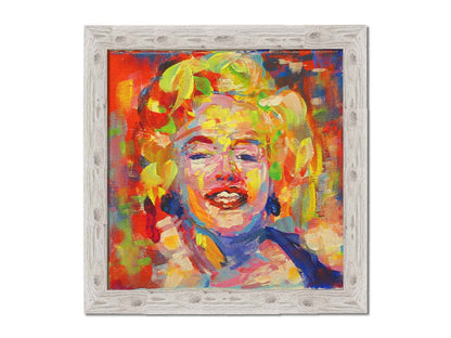 A portrait painting of Marilyn Monroe made with unblended, broad palette knife strokes. Printed on canvas and framed.