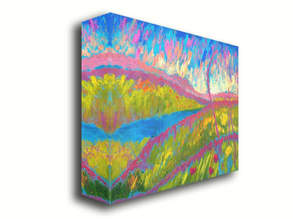 An abstracted painting of a green hilly landscape, with bright blue water and pink flowers. Printed on canvas.