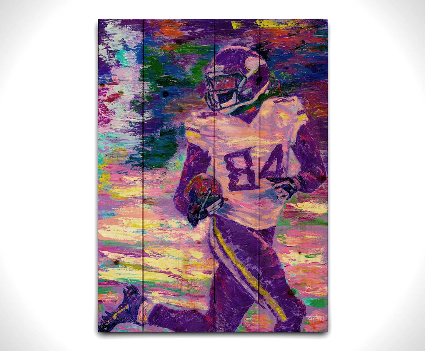 A painting of Minnesota Vikings football player Randy Moss, running down the field with the football. Printed on a wood pallet.