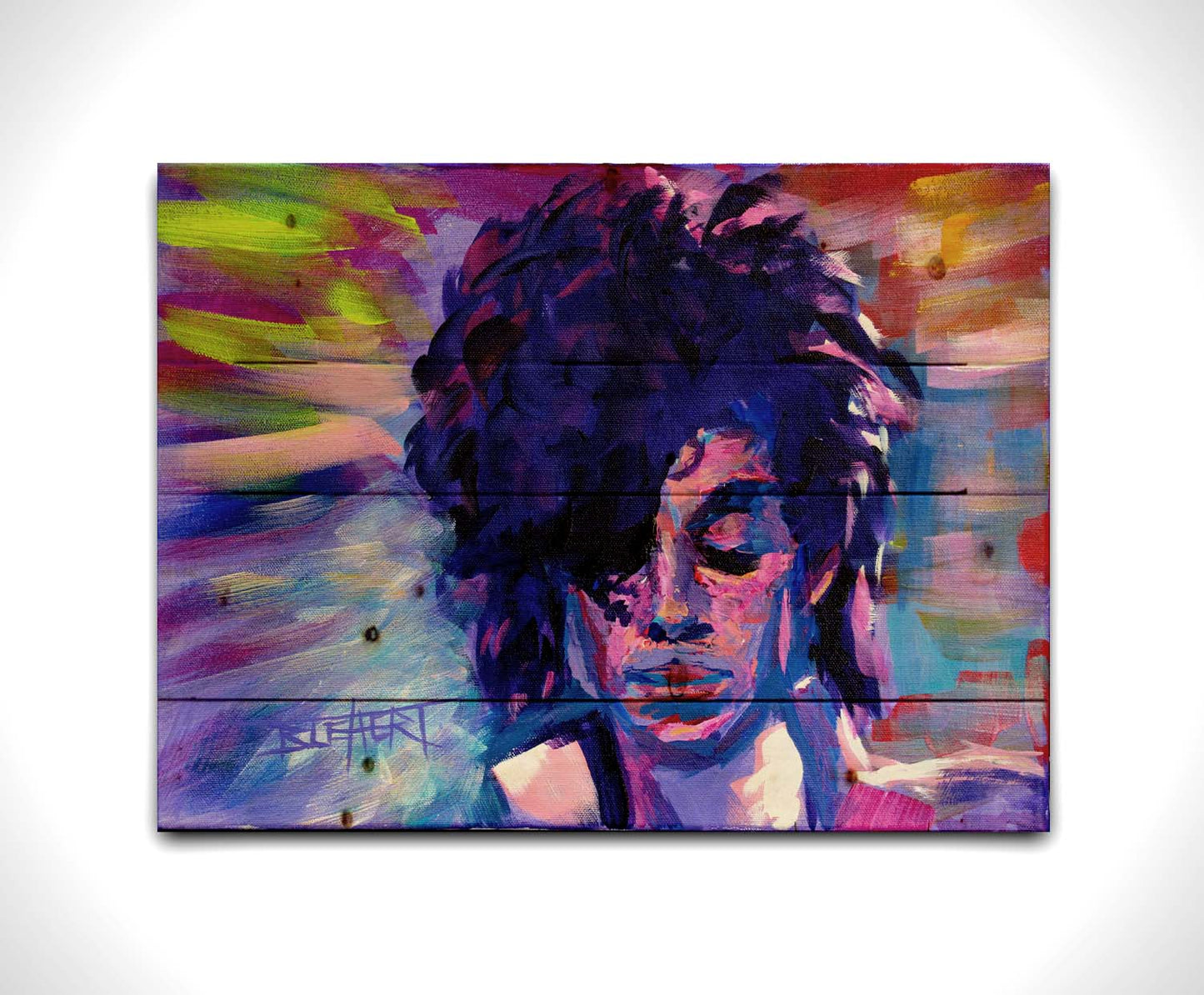 A painting of legendary musician Prince, painted in arbitrary color with visible brushstrokes. Printed on a wood pallet.