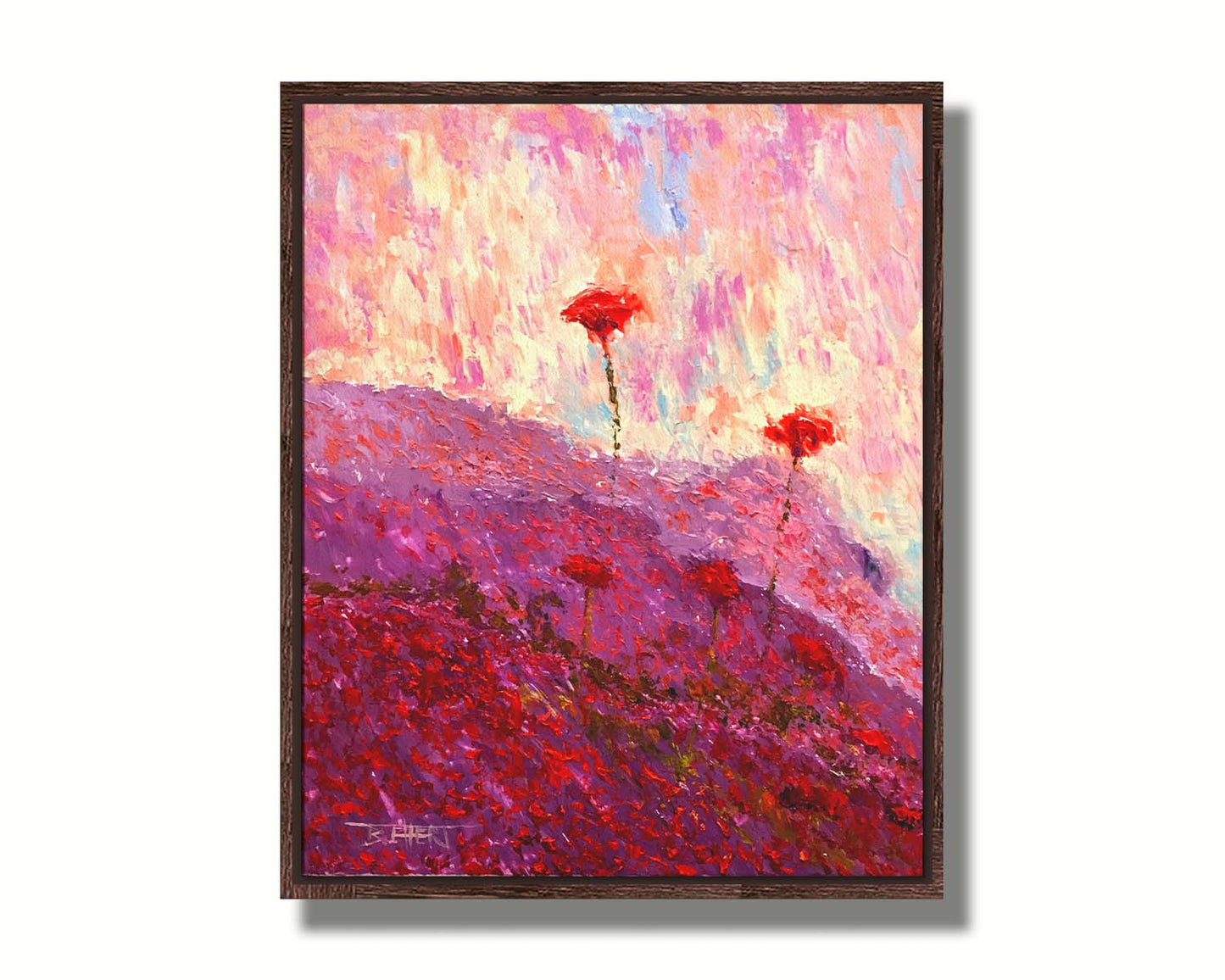 A painting of a field of poppies, hills covered in pink and red blooms. Printed on canvas in a float frame.