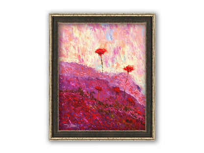 A painting of a field of poppies, hills covered in pink and red blooms. Printed on canvas and framed.