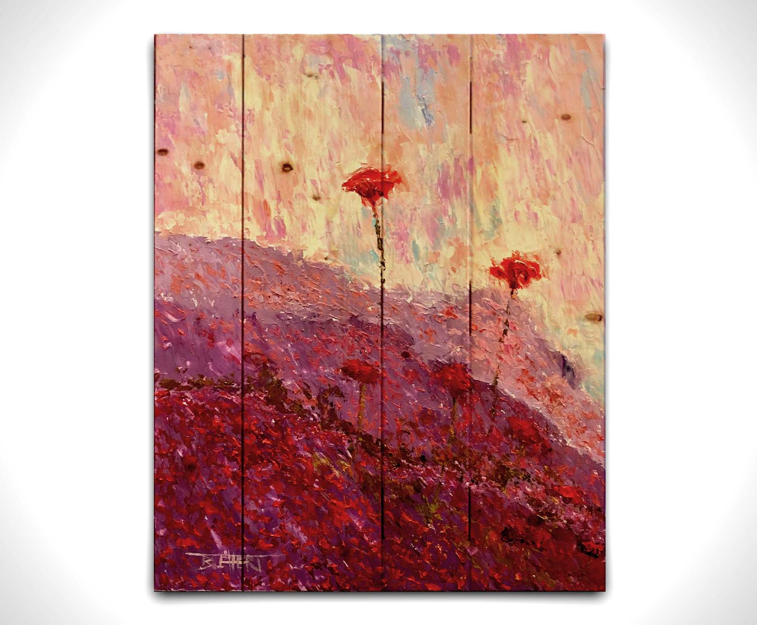 A painting of a field of poppies, hills covered in pink and red blooms. Printed on a wood pallet.