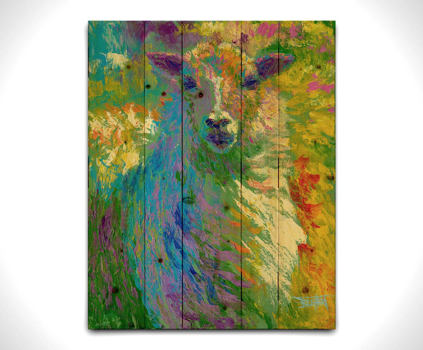 A colorful, bold painting of a sheep. The arrangement of color and visible brushstrokes emphasize the form and flow of the sheep's wool. Printed on a wood pallet.