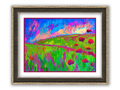 A painting of  the morning sunrise over a hilly meadow of brigh green grass and pink and red flowers. Printed on paper, matted, and framed.