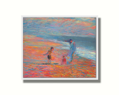 A painting of a group of people on the beach at sunset. Children play in the sand illuminated by the orange light, which contrasts sharply with the blue tones of the sea. Printed on canvas in a float frame.