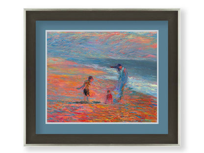 A painting of a group of people on the beach at sunset. Children play in the sand illuminated by the orange light, which contrasts sharply with the blue tones of the sea. Printed on paper, matted, and framed.