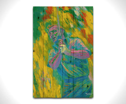 A painting of golf legend Arnold "The King" Palmer holding a golf club. Painted in arbitrary color with visible palette knife and brush strokes that emphasize movement. Printed on a wood pallet.