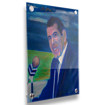 A painting of sportscaster Herb Carneal, play-by-play commentator for the MInnesota Twins baseball team. He is dressed in a suit, sitting at a microphone. Printed on acrylic.