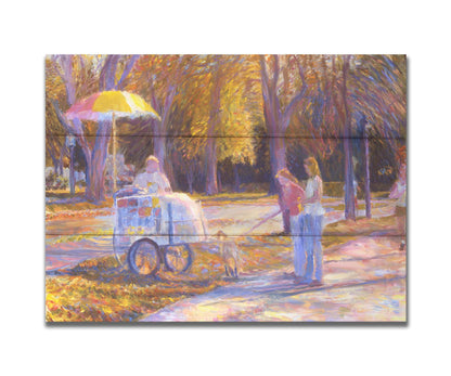 An impressionism-inspired painting of people walking down a park path with their dog during autumn. They have stopped at a concession cart. Printed on a box board.