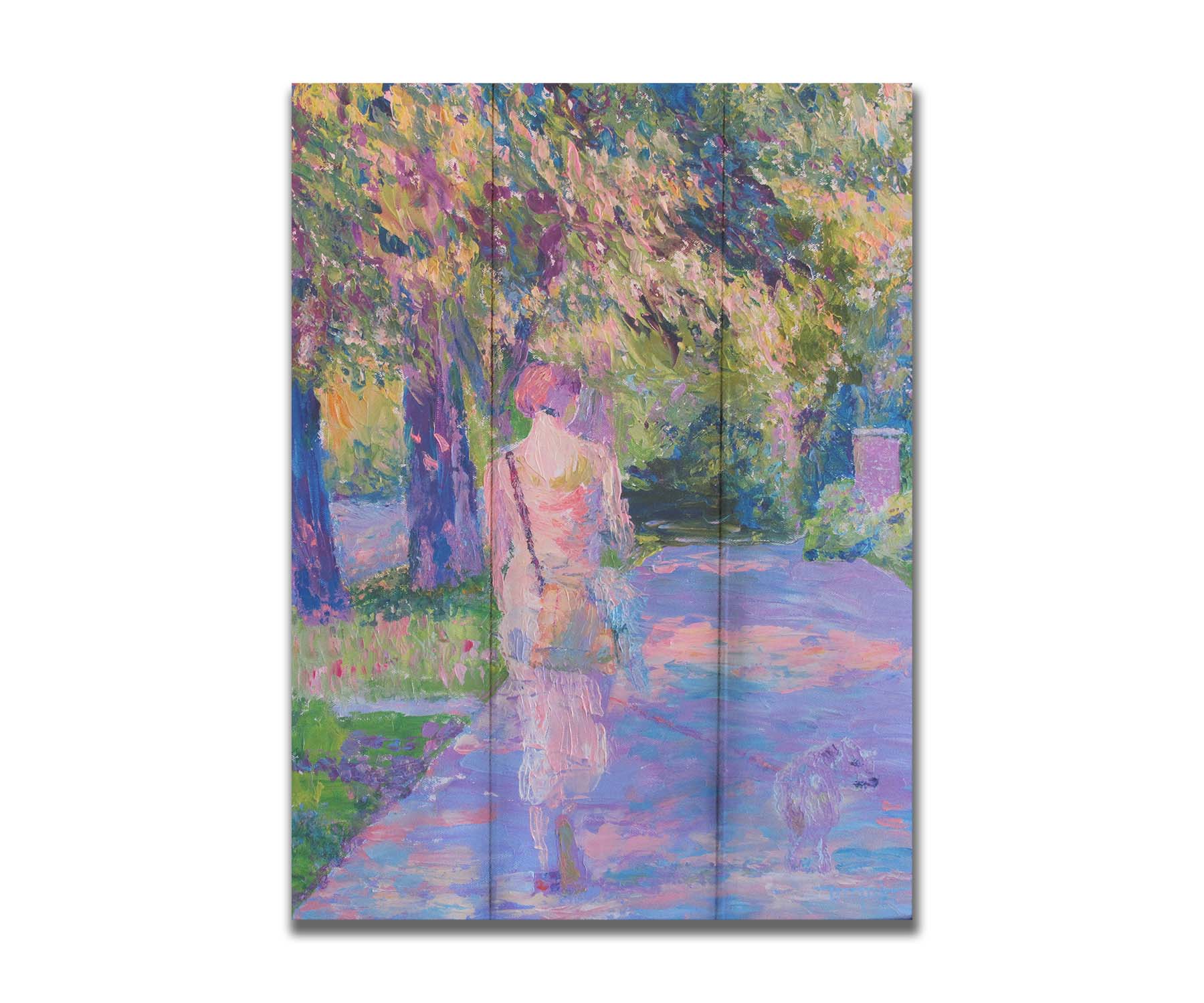 A painting of a woman walking her dog along a city sidewalk through a park. The leaved are turning yellow and red. Printed on a box board.