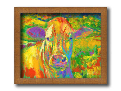 A painting of a cow standing in a pasture. It is painted in arbitrary colors, using a broad spectrum of bright colors from red through purple. Printed on canvas and framed.