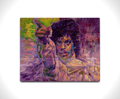 A painting of the highly acclaimed musician Prince dancing. It is painted in a primarily purple palette, a color with which Prince is heavily associated, accented by green. Printed on a wood pallet.