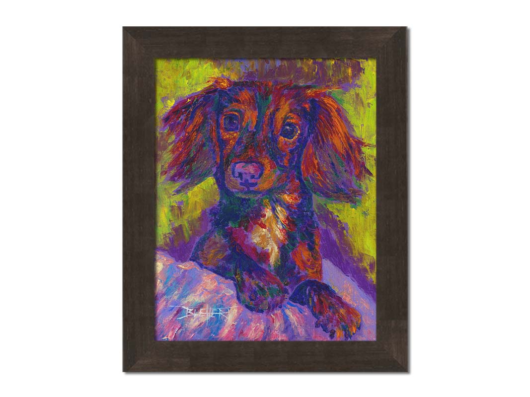 A painting of a dachshund, or wiener dog, lying on a cushion or blanket. It is perking up playfully, and it is painted using a purple, green, and brown palette. Printed on canvas and framed.