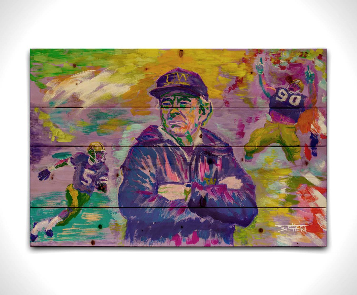 A painting of the University of Washington's 1991 national football team, including coach Don James, defensive end Steve Emtman, and wide receiver Mario Bailey. Their portraits are collaged on an abstract, colorful background in primarily purples and yellows, accented with reds, greens, and blues. Printed on a wood pallet.