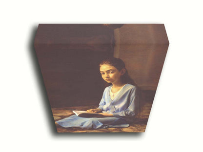 A portrait painting of a young girl dressed in blue and sitting on the floor, reading a book. It is painted in a softly lit, realistic, classical style reminiscent of the Renaissance. Printed on canvas.