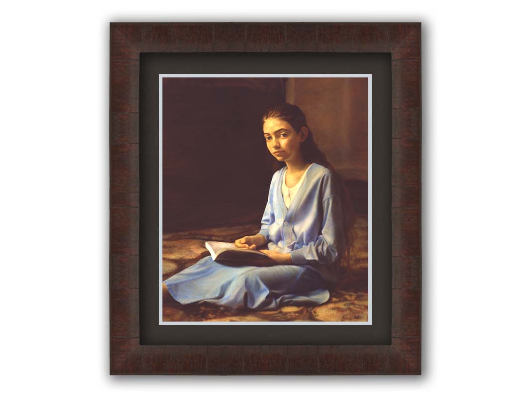 A portrait painting of a young girl dressed in blue and sitting on the floor, reading a book. It is painted in a softly lit, realistic, classical style reminiscent of the Renaissance. Printed on paper, matted, and framed.