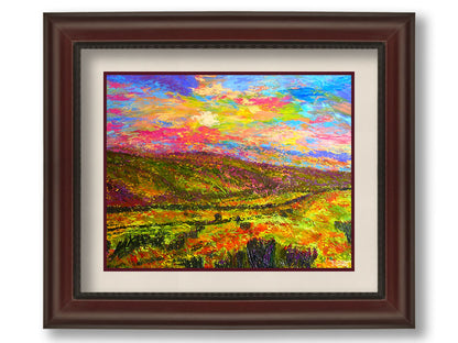 A textured, colorful impressionistic painting of a hilly meadow of flowers and an equally colorful sky. Printed on paper, matted, and framed.