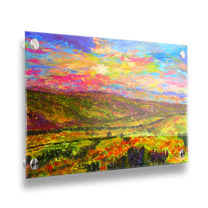 A textured, colorful impressionistic painting of a hilly meadow of flowers and an equally colorful sky. Printed on acrylic.