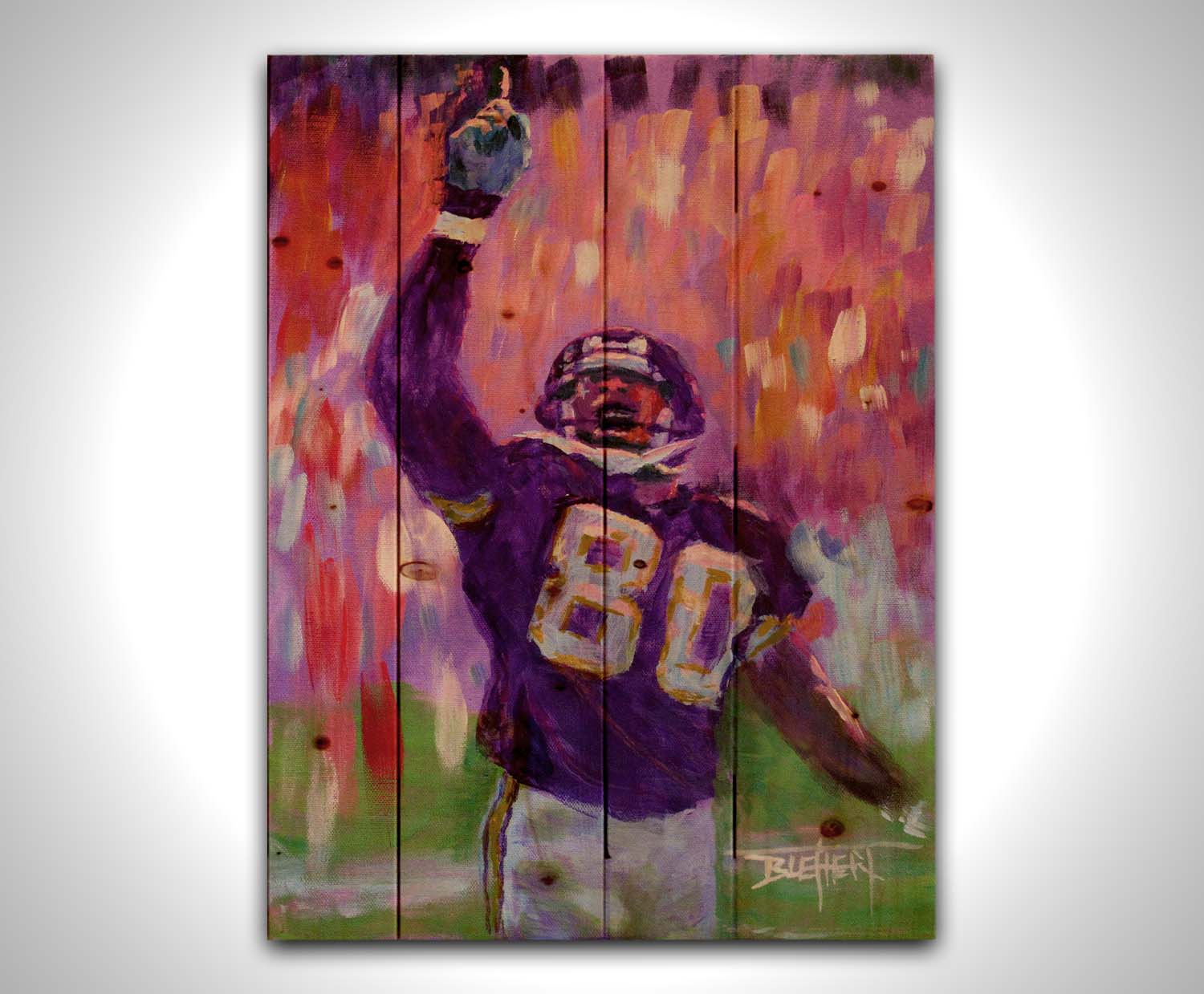 A painting of Minnesota Vikings football player Cris Carter on the field, painted primarily in purples and reds. Printed on a wood pallet.