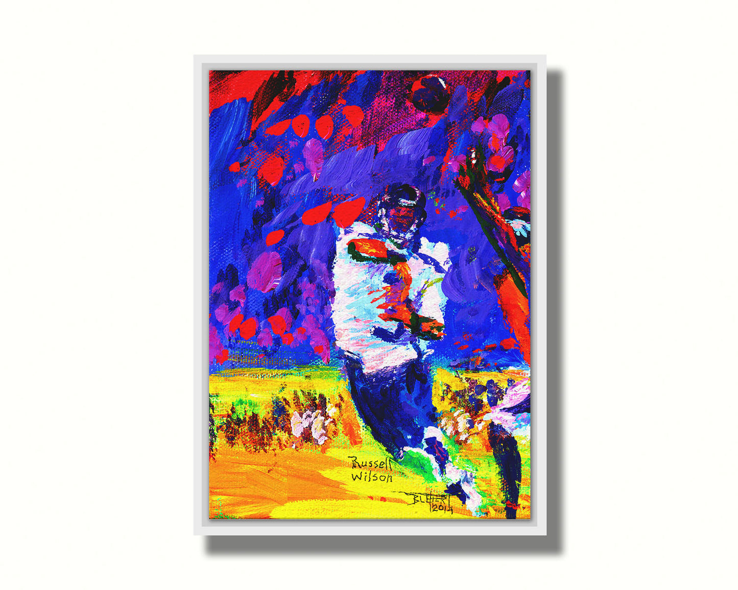 A painting of Seattle Seahawks gridiron football player in a dynamic pose, having just thrown a pass to his teammate. It is painted with bright, highly saturated purples, reds, blues, and yellows. Printed on canvas in a float frame.