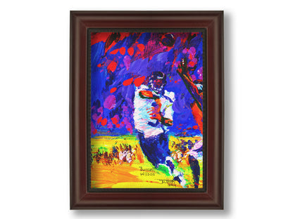 A painting of Seattle Seahawks gridiron football player in a dynamic pose, having just thrown a pass to his teammate. It is painted with bright, highly saturated purples, reds, blues, and yellows. Printed on canvas and framed.