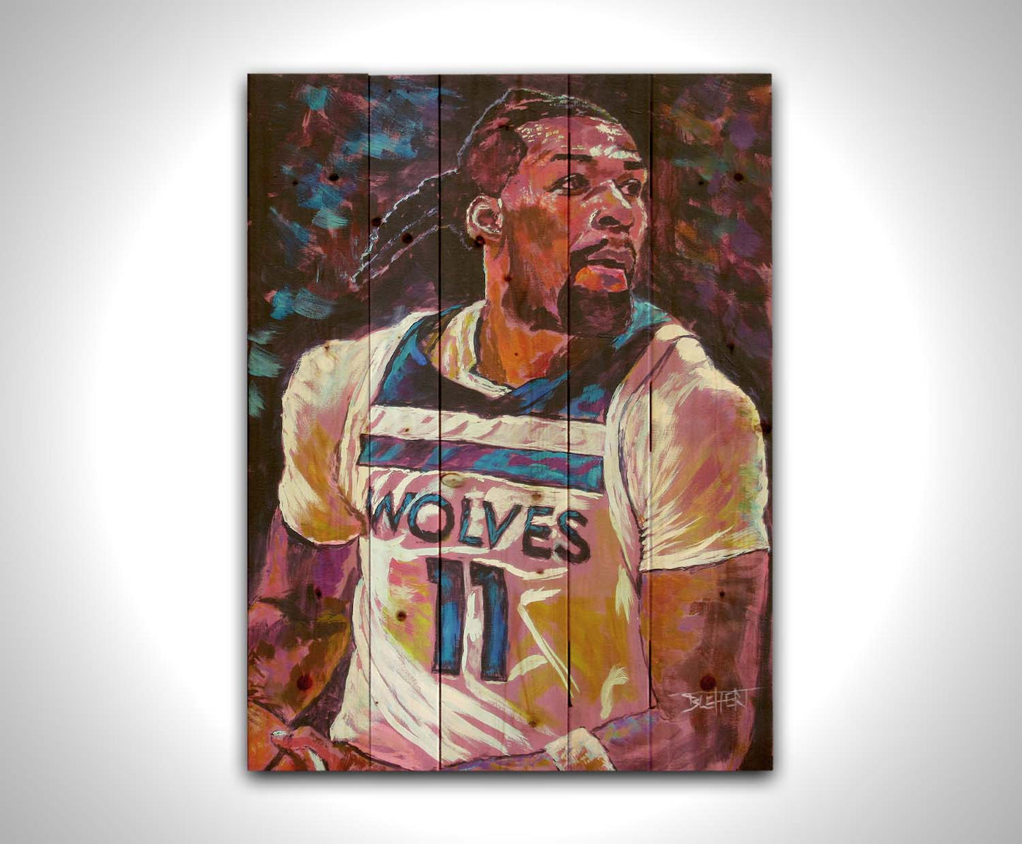 A painting of Minnesota Timberwolves basketball player Naz Reid holding the ball. Printed on a wood pallet.