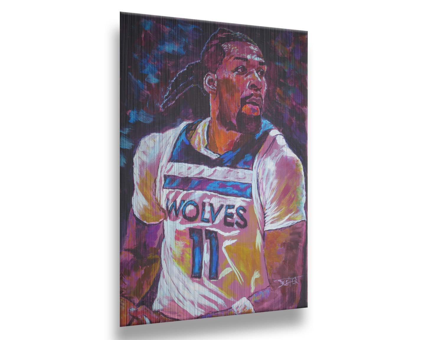 A painting of Minnesota Timberwolves basketball player Naz Reid holding the ball. Printed on metal.