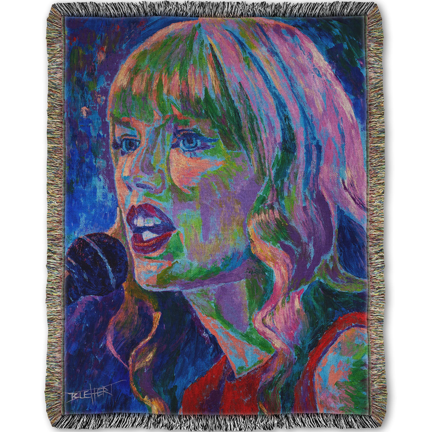 Woven throw blanket with a colorful portrait of Taylor Swift singing into a microphone.
