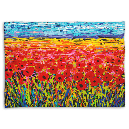 A coral fleece blanket designed with a drip painting of a field of red flowers, created with a rainbow of vibrant colors.