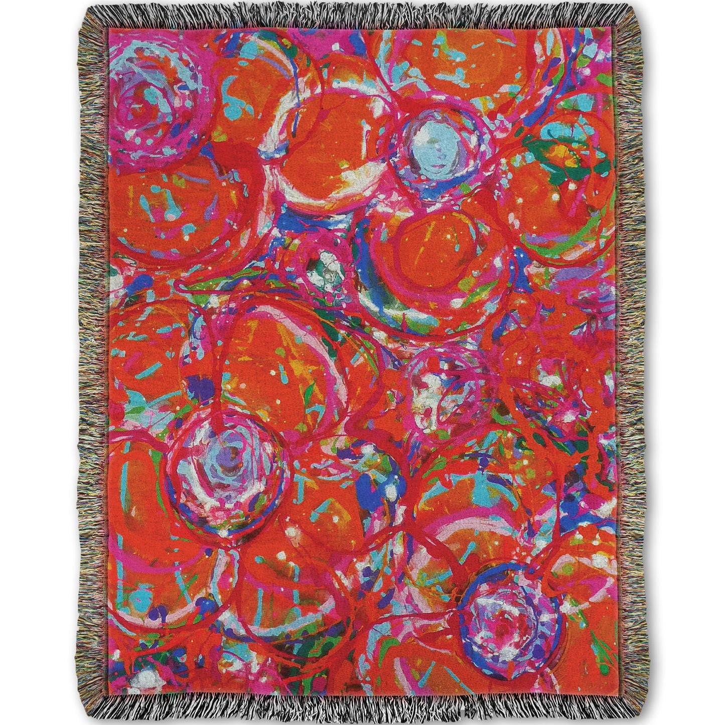 A woven throw blanket designed with a drip painting of a cluster of abstracted flowers created with splatters of orange, red, and pink with accents of green, blue, yellow, and purple.