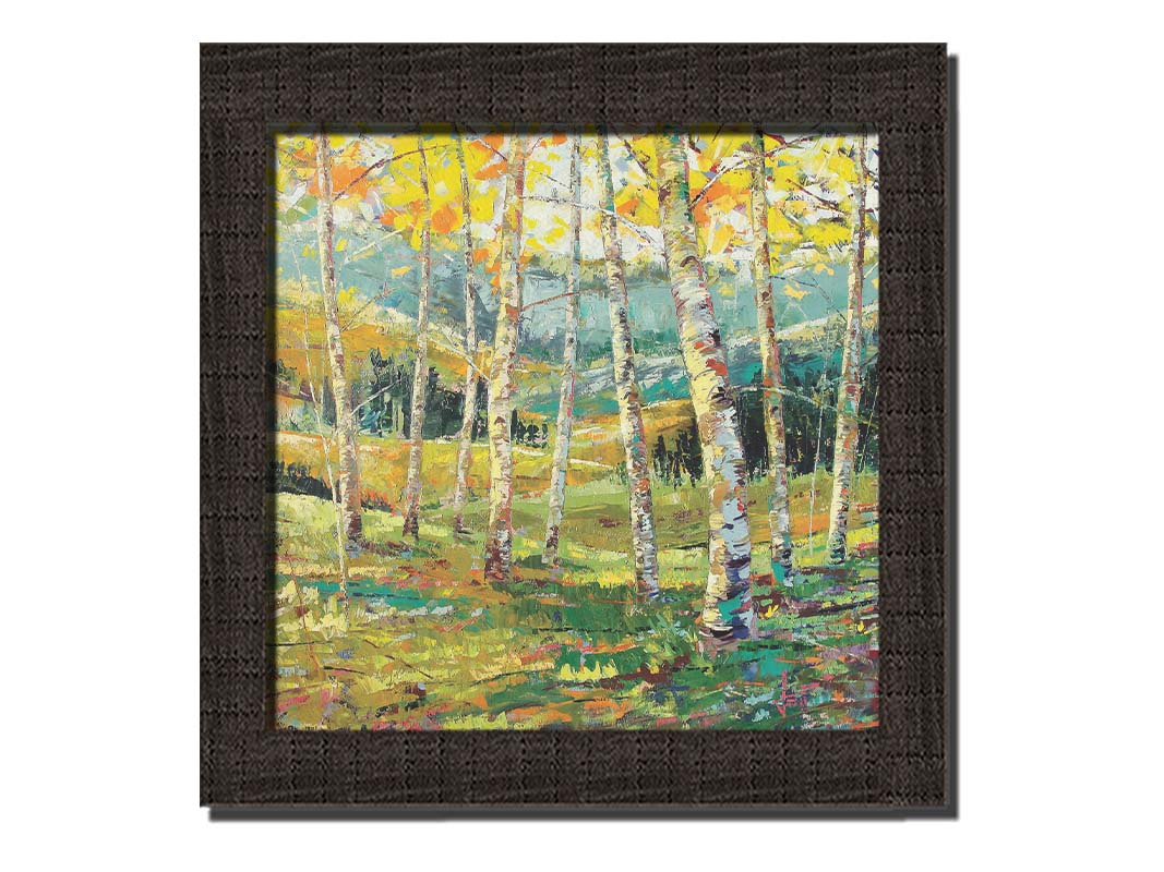 A painting of a birch forest with the yellow leaves of fall. Printed on canvas and framed.