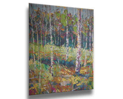 A painting of a birch forest in a variety of colors, from dark blue shadows in the distance to soft green grasses. Printed on metal.