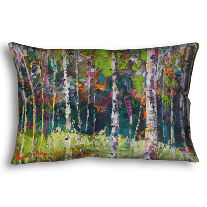 A throw pillow designed with a painting of a birch forest in a variety of vibrant colors with textured brushwork.