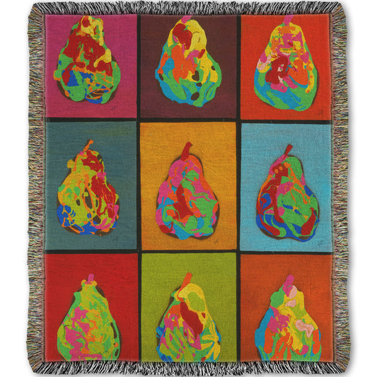 A woven throw blanket designed with a drip painting of six abstracted pears in arbitrary colors, arranged in a colorful grid of flat color panels. 
