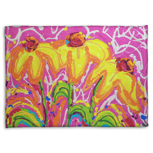 A fleece blanket designed with a drip painting of three yellow wildflowers on a pink background, accented by orange, blue, green, and white.
