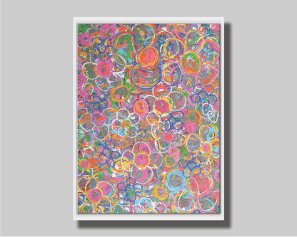 An abstract drip painting of many simplified flower shapes, utilizing a wide range of bright colors. Printed on canvas in a float frame.