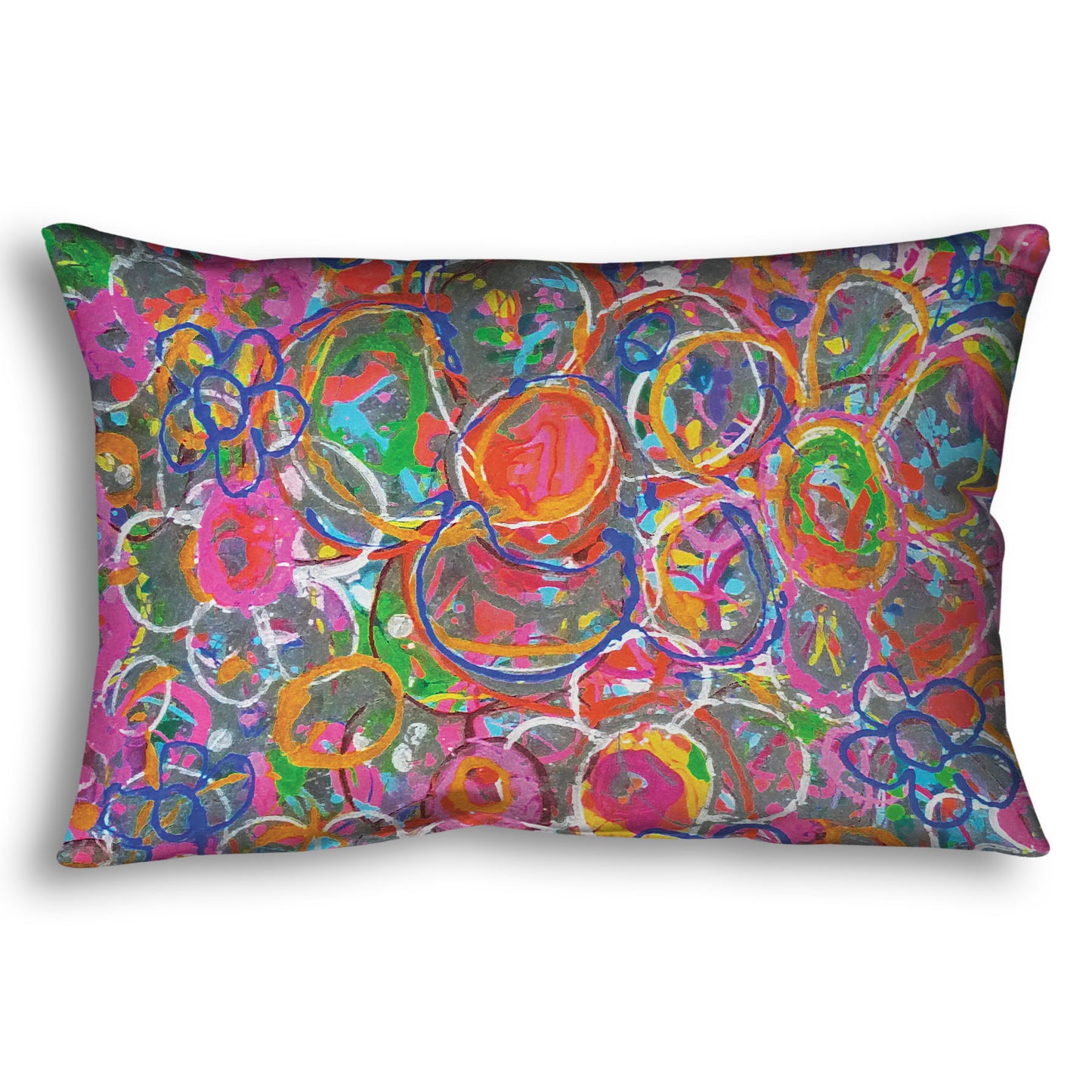 A throw pillow designed with an abstract drip painting of many simplified flower shapes, utilizing a wide range of bright colors.