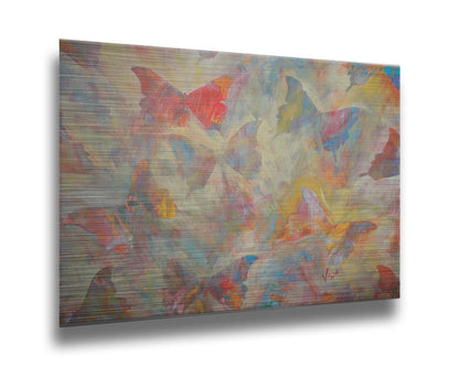 An abstracted painting of a pattern of butterflies, created in an array of colors with textured brushstrokes. Printed on metal.