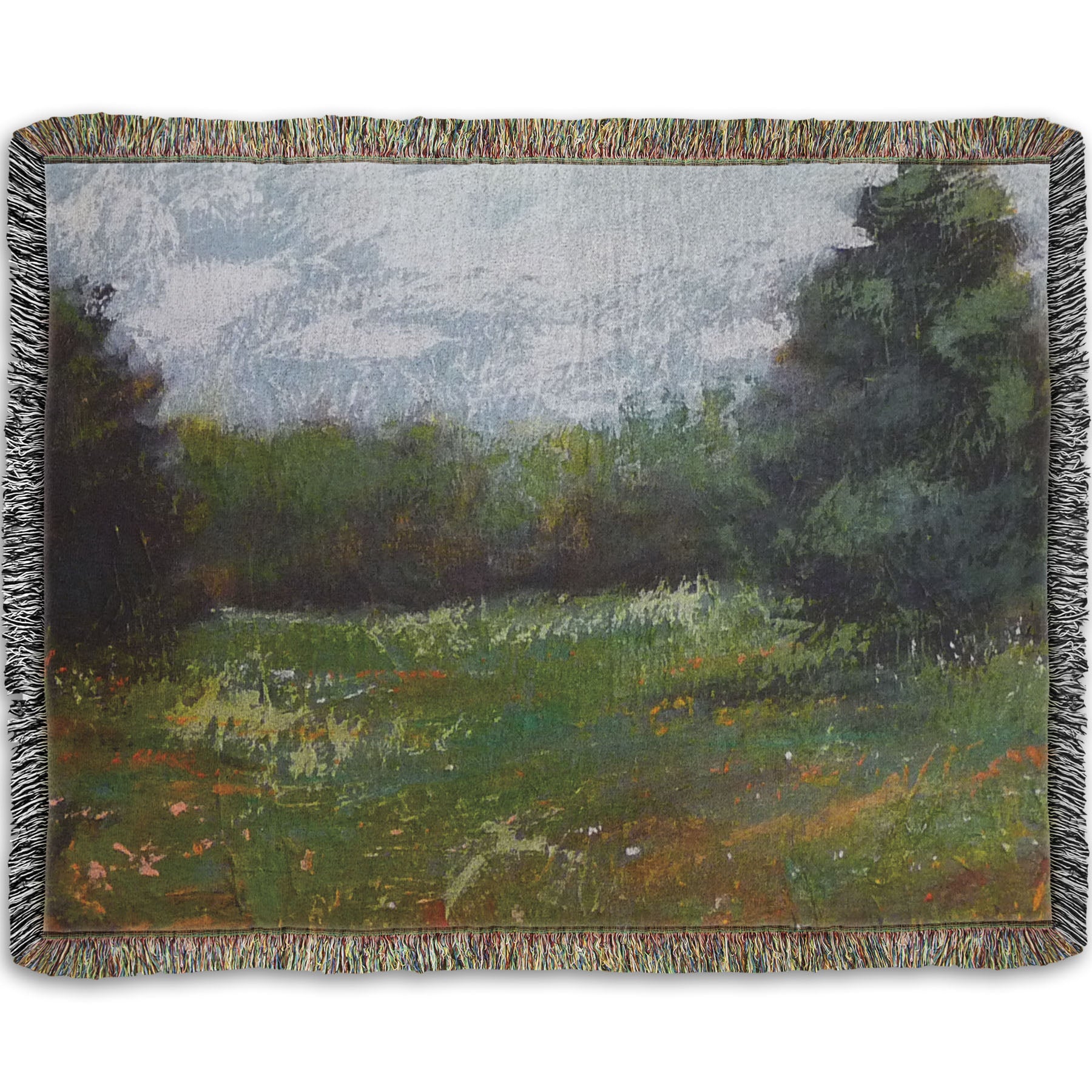 A woven throw blanket designed with an expressive painting of a grassy field and grove of trees.